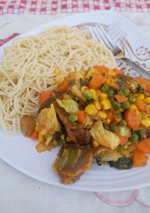 A picture of Spaghetti with veggies sauce.