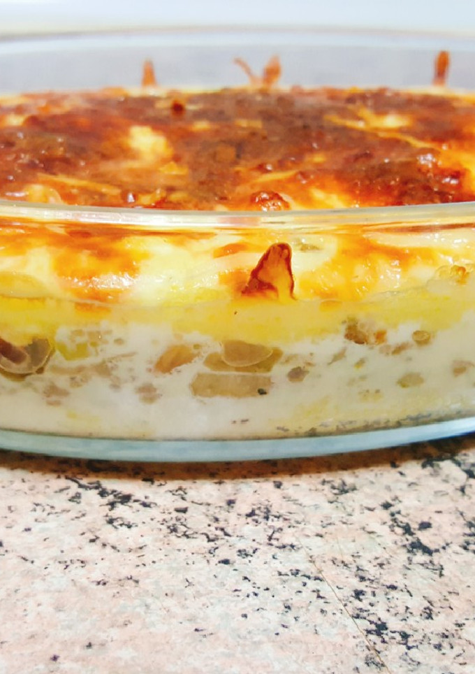 Una foto de Pastel de polenta con puerro al horno