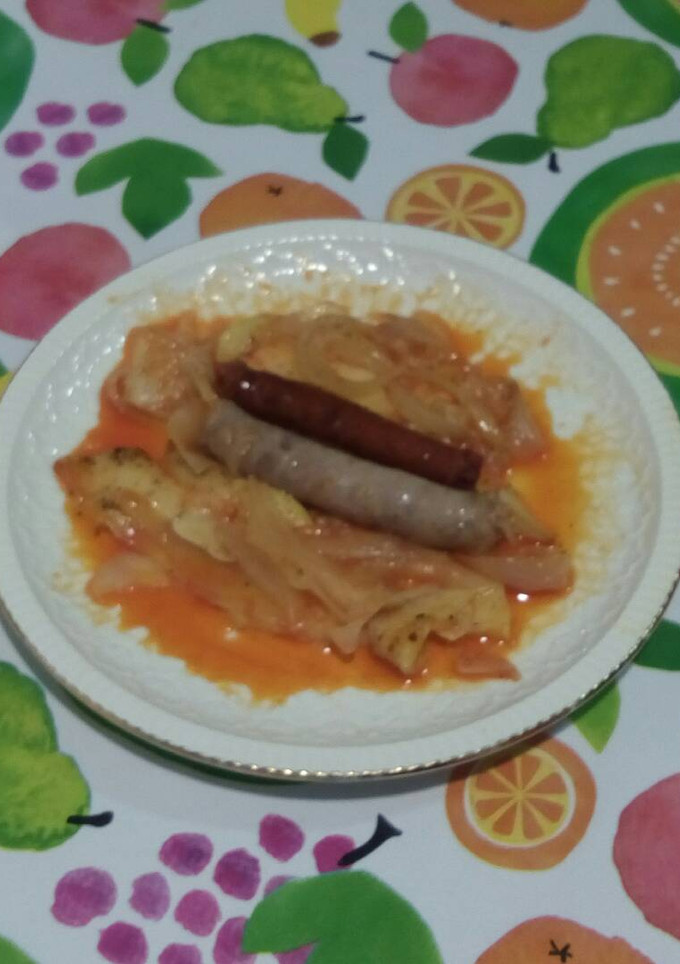 Una foto de Duo de longanizas con patata y cebolla