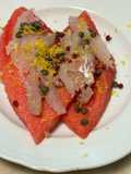 Carpaccio di merluzzo con anguria capperi e limone