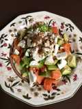 Ensalada de papaya queso de cabra y vaca