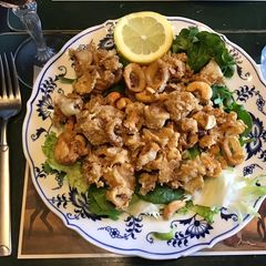 A picture of 675. California Farm Fried Calamari Cashew Salad.