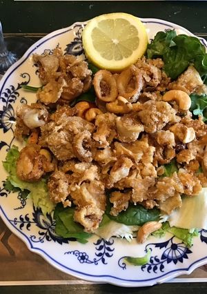 A picture of 675. California Farm Fried Calamari Cashew Salad.