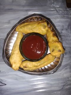 हरी मिर्च के पकोड़े(hari mirch ke pakode recipe in hindi) रेसिपी मुख्य फोटो