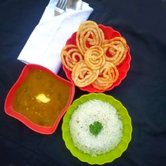 A picture of Punjabi style Rajma, Jeera Rice and Jalebi.