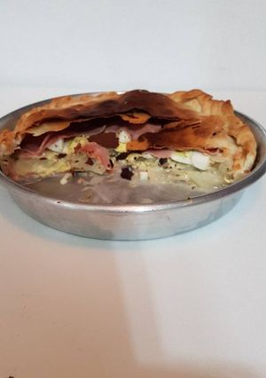 Una foto de Tarta de jamón, queso y cebolla