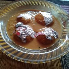A picture of Khejur gurer rasmalai.