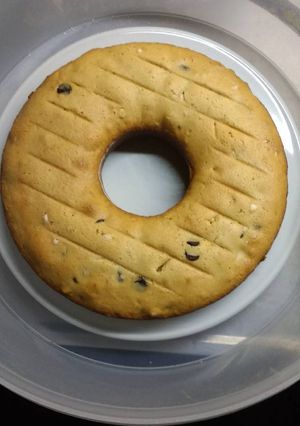 Una foto de Budín de vainilla con chips de chocolate blanco y negro