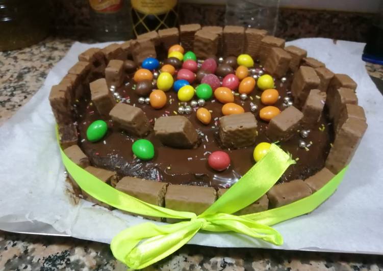 Steps to Prepare Super Quick Homemade Tarta de chocolate con Huesitos