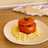 Tomate relleno de carne picada con cous cous