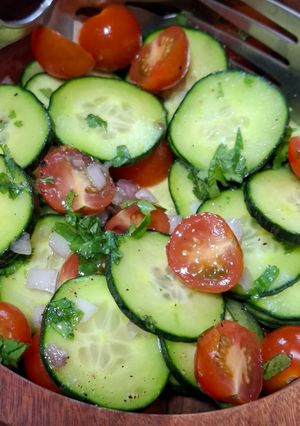 A picture of Cucumber and Cherry Tomato Salad.
