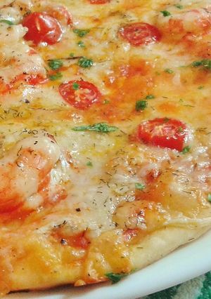 Una foto de Pizza de gambas