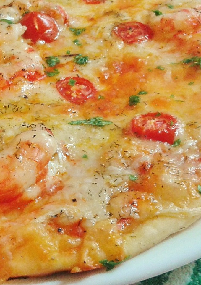 Una foto de Pizza de gambas