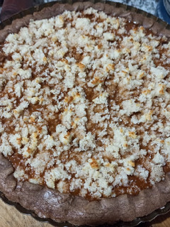 Una foto de Tarta de chocolate, dulce de leche y coco