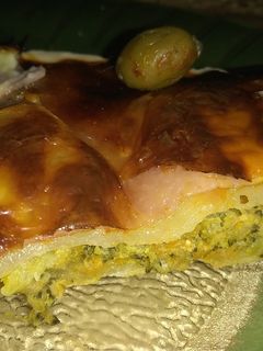 Una foto de Pizza rellena con brócoli sin TACC