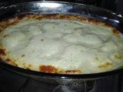 Una foto de papa gratinadas al horno