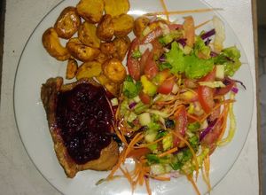 Una foto de Lomo de cerdo con salsa de mora