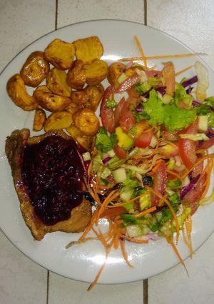 Una foto de Lomo de cerdo con salsa de mora