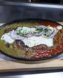 Milanesa de res gratinada con queso panela