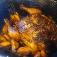 Whole Deep-Fried Chicken w/potatoes A picture of Whole Deep-Fried Chicken w/potatoes.