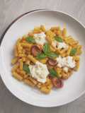 Macaroni sausage corn cheese with burrata