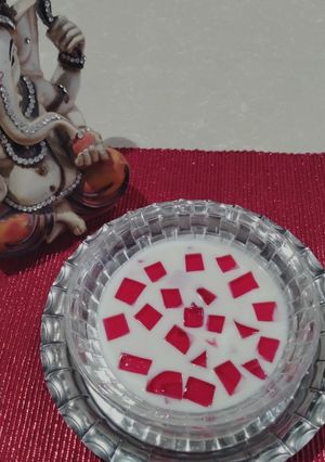 A picture of Shrikhand with strawberry flavour jelly.