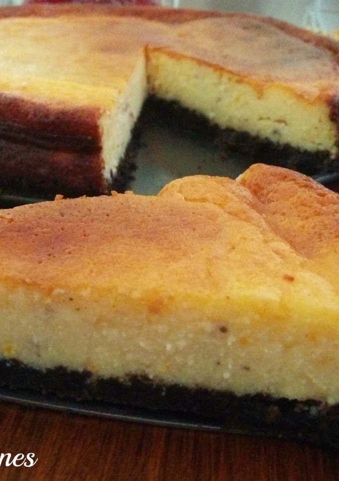 Una foto de Tarta de queso de naranja con base de galletas Oreo