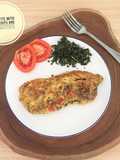 Omelette with kale chips and tomato