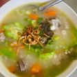 Cháo xương+ thịt bầm ăn kèm khổ qua