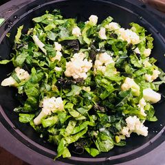 A picture of Organic Home Grown Cauliflower and Greens Salad.