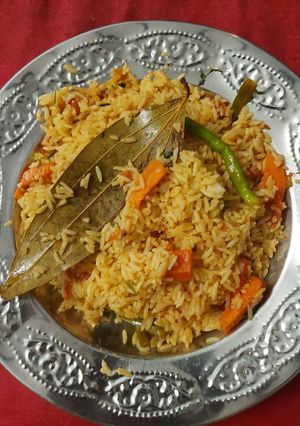 A picture of Veg Biryani with leftover rice.