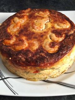 Una foto de Tarta de verduras y gambas
