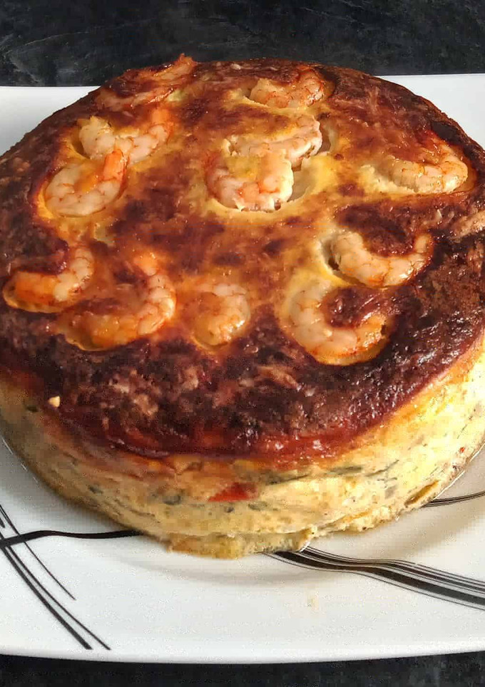 Una foto de Tarta de verduras y gambas