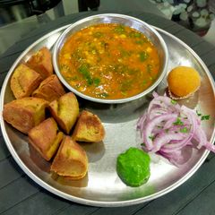 A picture of Bafla Baati and Daal with Spinach.