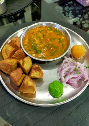 A picture of Bafla Baati and Daal with Spinach.
