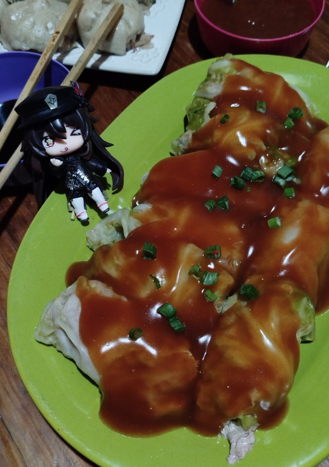 Una foto de Rollitos de jade Baicai rellenos de cerdo