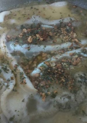 Una foto de Gallo al vino blanco