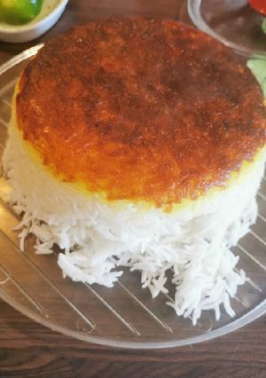 A picture of Persian rice with crispy grated potato TAHDIG.