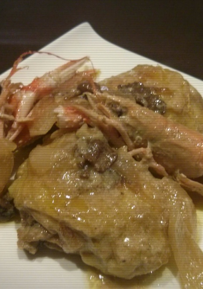 Una foto de Cazuela de pollo con cigalas al cava