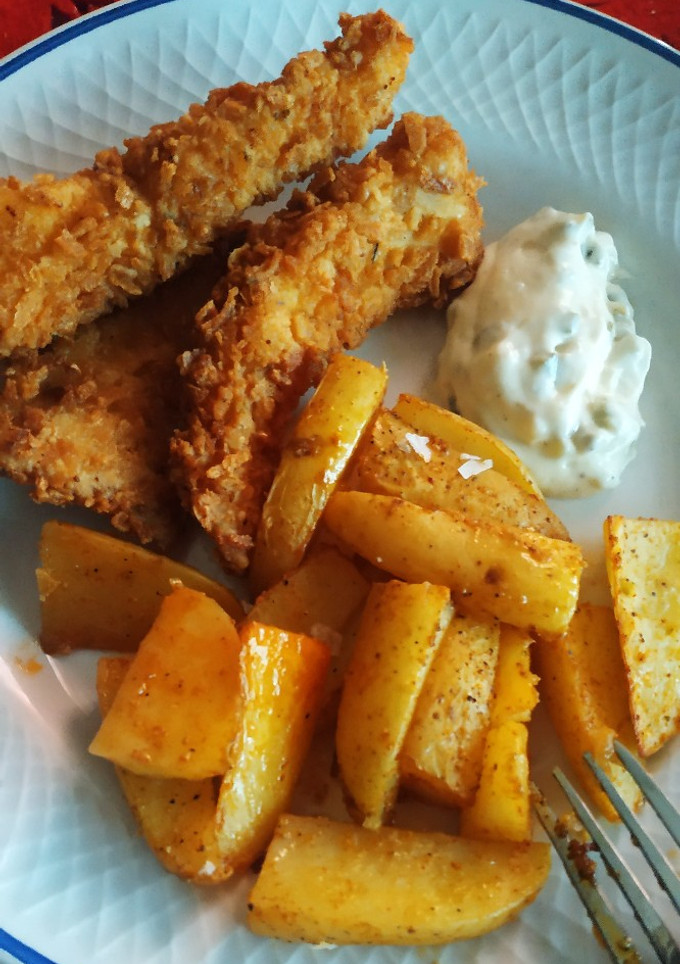 Una foto de Fish and chips con salsa tártara!
