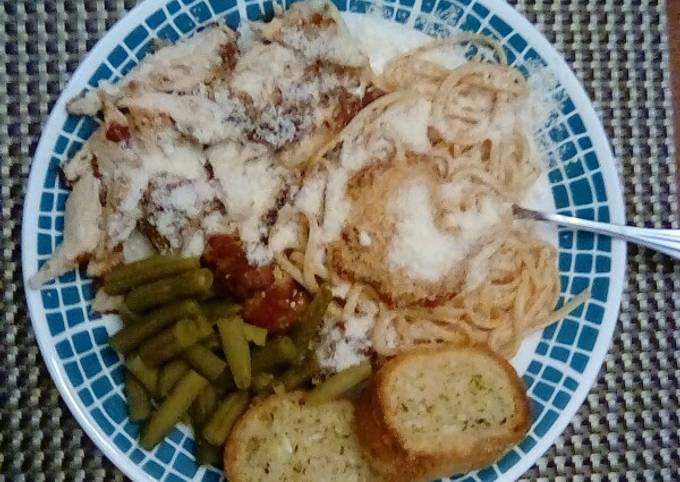 Chicken Parmesan With Spaghetti and Garlic Bread