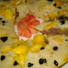 A picture of Layerd suji mango cake.