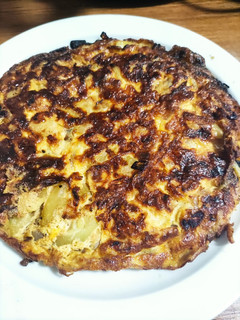 Una foto de Tortilla de calabacín y cebolla