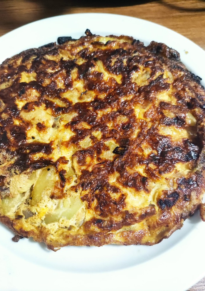 Una foto de Tortilla de calabacín y cebolla