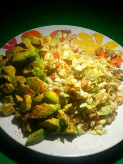A picture of Cabbage,avacado with sausage.