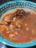 Pork in Milpa Tomato Sauce with Green Chiles and Epazote