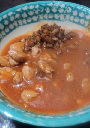 A picture of Pork in Milpa Tomato Sauce with Green Chiles and Epazote.