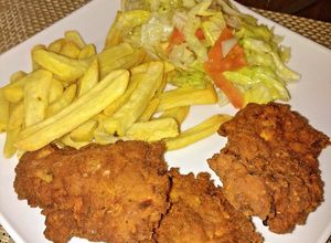 Una foto de Pollo al estilo KFC