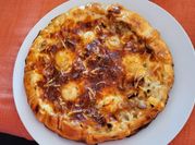 Una foto de entrantes con masa brisa