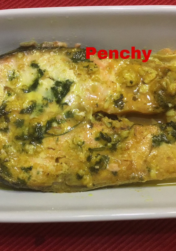 Una foto de Salmón fresco macerado al horno con curry de Madras